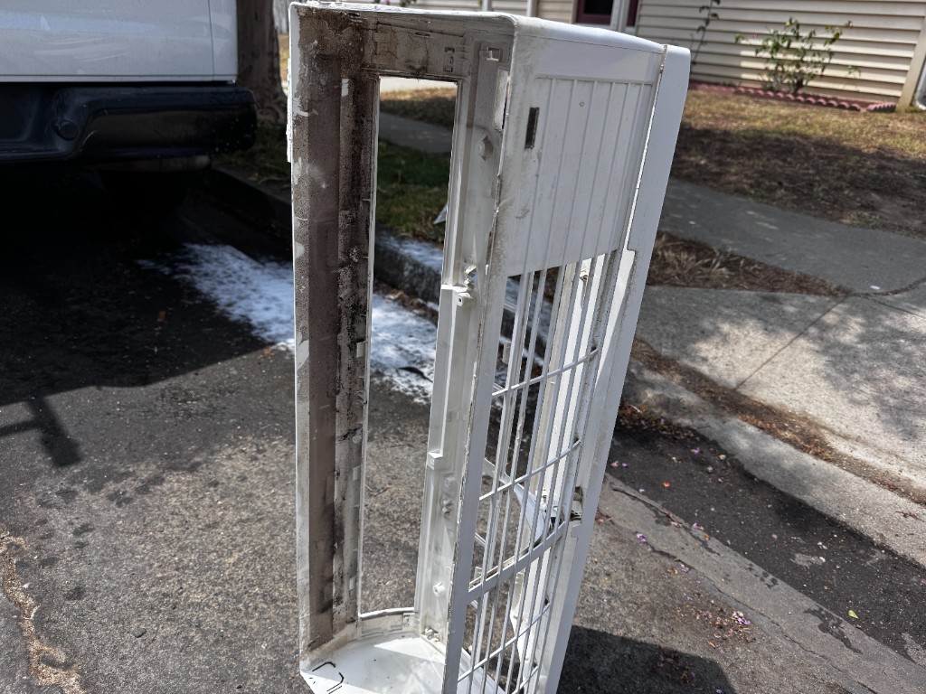 Heavy mold on mini split cover interior before professional wash