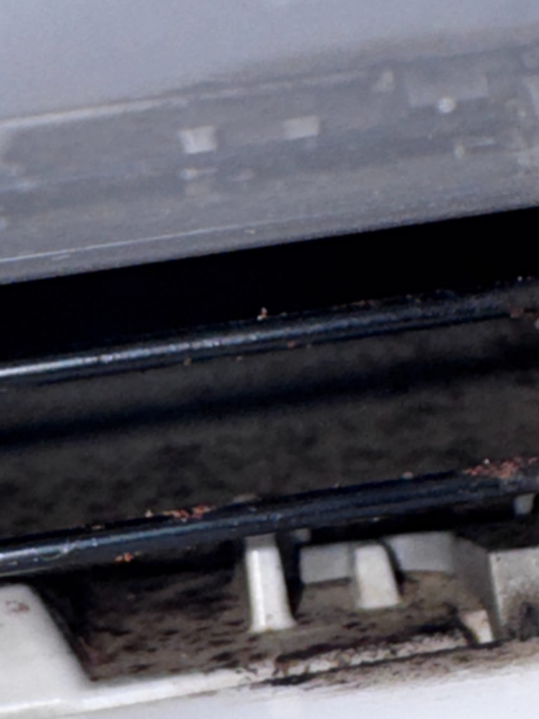 Mold and grime inside mini split air vents before deep cleaning