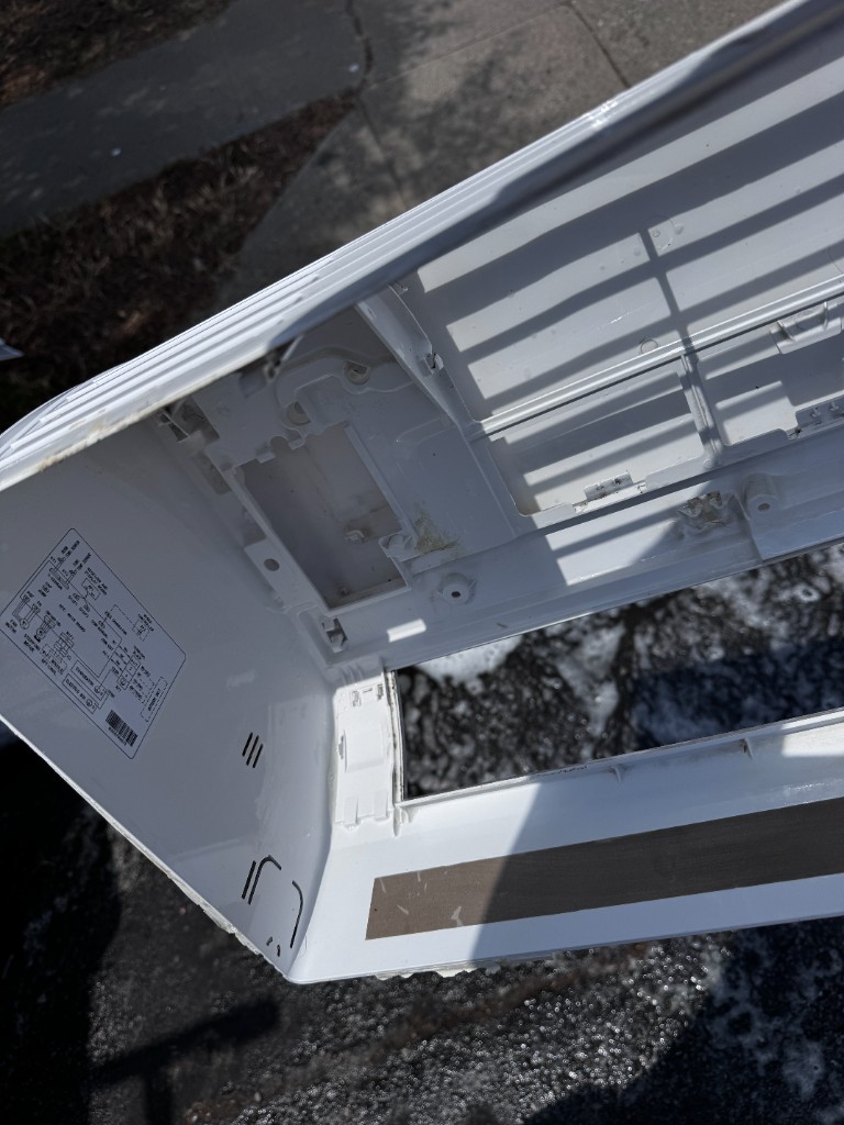 Clean white AC cover after washing