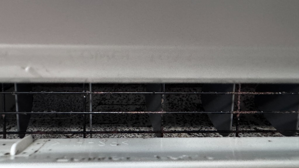 Mold and dust inside mini split vents before cleaning